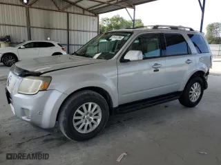 2010 Mercury Mariner Premier with VIN 4M2CN8HG2AKJ00812, listed as a Copart auction lot 61412784 with 215,509 mi miles and Salvage Title. Bid and sale history available at carsss.com. Image 1.