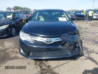 2013 Toyota Camry L with VIN 4T1BF1FK1DU666784, listed as a IAAI auction lot 41869487 with 99,396 mi miles. Bid and sale history available at carsss.com. Image 6.