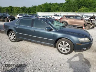 2004 Volkswagen Phaeton V8 z VIN WVWAF63D848010657, wystawiony jako Copart lot #56595145 z przebiegiem 192 013 mil mil oraz Szkoda całkowita • Salvage title. Historia ofert i sprzedaży dostępna na DreamBid. Obrazek 4.