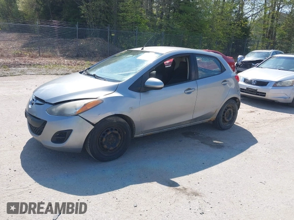 2012 Mazda 2 Sport with VIN JM1DE1KY1C0142339, listed as a IAAI auction lot 42227688 with 259,568 mi miles and . Bid and sale history available at DreamBid. Image 2.