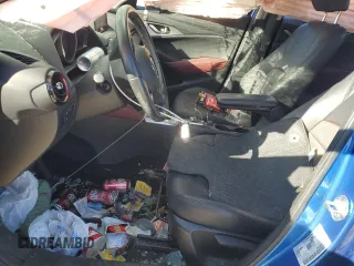 2016 Mazda CX-3 Touring z VIN JM1DKBC75G0114585, wystawiony jako Copart lot #42182235 z przebiegiem 34 725 mil mil oraz Szkoda całkowita • Salvage title. Historia ofert i sprzedaży dostępna na DreamBid. Obrazek 7.