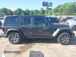 2021 Jeep Wrangler Unlimited Sport S with VIN 1C4HJXDG3MW801301, listed as a IAAI auction lot 42319387 with Not provided miles and . Bid and sale history available at DreamBid. Image 13.
