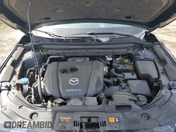2021 Mazda CX-5 Grand Touring with VIN JM3KFBDM2M0494679, listed as a Copart auction lot 50017675 with 25,965 mi miles and Salvage Title. Bid and sale history available at carsss.com. Image 12.