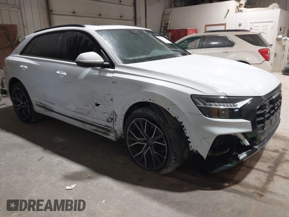 2021 Audi Q8 Premium Plus z VIN WA1EVAF11MD013975, wystawiony jako IAAI lot #41380207 z przebiegiem 77 979 mil mil oraz . Historia ofert i sprzedaży dostępna na DreamBid. Obrazek 1.