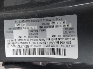 2018 Mazda 3 Touring with VIN 3MZBN1V35JM174323, listed as a IAAI auction lot 41412732 with 80,008 mi miles. Bid and sale history available at carsss.com. Image 9.