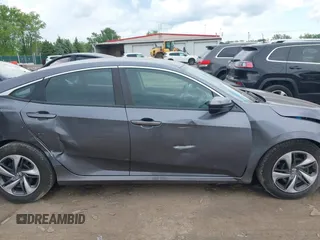 2020 Honda Civic LX z VIN 2HGFC2F62LH547412, wystawiony jako IAAI lot #42254847 z przebiegiem 62 519 mil mil oraz . Historia ofert i sprzedaży dostępna na DreamBid. Obrazek 13.