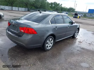 2009 Kia Optima LX with VIN KNAGE228495311622, listed as a IAAI auction lot 41628803 with 1 mi miles. Bid and sale history available at carsss.com. Image 4.