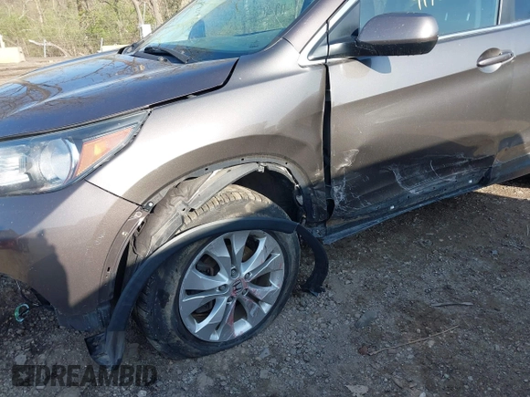 2014 Honda CR-V EX z VIN 2HKRM4H50EH668801, wystawiony jako IAAI lot #41909629 z przebiegiem 128 629 mil mil oraz . Historia ofert i sprzedaży dostępna na DreamBid. Obrazek 6.