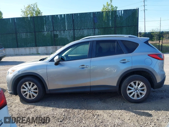 2014 Mazda CX-5 Touring with VIN JM3KE4CY0E0302583, listed as a IAAI auction lot 41947735 with 122,077 mi miles. Bid and sale history available at carsss.com. Image 14.