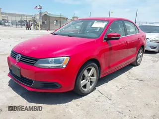 2013 Volkswagen Jetta TDI w/Premium with VIN 3VW3L7AJ6DM287865, listed as a IAAI auction lot 42480102 with 181,677 mi miles and . Bid and sale history available at DreamBid. Image 2.