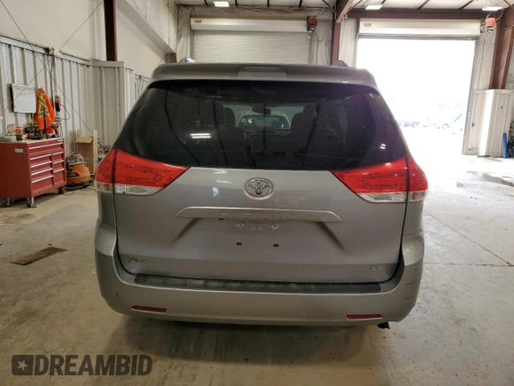 2012 Toyota Sienna LE AAS с VIN 5TDKK3DCXCS244099, выставлен на аукционе Copart как лот 57653065 с пробегом 74 127 миль миль и Чистый • Clean title. История ставок и продаж доступна на DreamBid. Изображение 6.