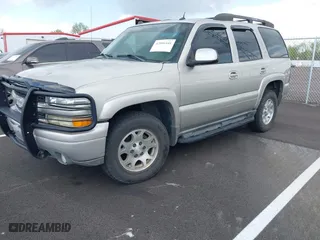 2005 Chevrolet Tahoe LT with VIN 1GNEK13TX5R179282, listed as a IAAI auction lot 42006441 with 245,118 mi miles. Bid and sale history available at carsss.com. Image 2.