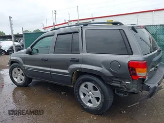 2003 Jeep Grand Cherokee Laredo z VIN 1J4GW48S73C545863, wystawiony jako IAAI lot #42222247 z przebiegiem 128 529 mil mil oraz . Historia ofert i sprzedaży dostępna na DreamBid. Obrazek 14.