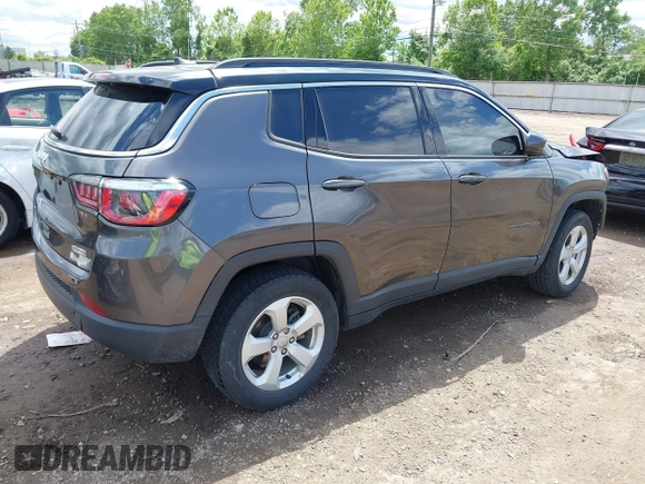 2018 Jeep Compass Latitude with VIN 3C4NJDBB5JT355582, listed as a IAAI auction lot 42351818 with 75,324 mi miles and . Bid and sale history available at DreamBid. Image 4.