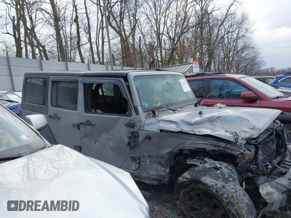 2014 Jeep Wrangler Unlimited Sport with VIN 1C4HJWDG1EL302087, listed as a IAAI auction lot 41420740 with 152,096 mi miles. Bid and sale history available at carsss.com. Image 14.
