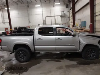 2023 Toyota Tacoma SR with VIN 3TMCZ5AN9PM604793, listed as a IAAI auction lot 42251347 with 39,741 mi miles and . Bid and sale history available at DreamBid. Image 14.