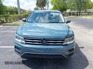 2019 Volkswagen Tiguan SE with VIN 3VV3B7AX8KM171057, listed as a IAAI auction lot 42209509 with 99,437 mi miles and . Bid and sale history available at DreamBid. Image 6.