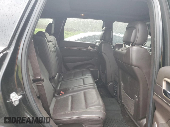 2014 Jeep Grand Cherokee Summit с VIN 1C4RJFJM2EC302534, выставлен на аукционе Copart как лот 61660155 с пробегом 206 823 миль миль и Списание • Salvage title. История ставок и продаж доступна на DreamBid. Изображение 11.