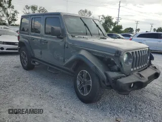 2019 Jeep Wrangler Unlimited Sport S with VIN 1C4HJXDG3KW583521, listed as a Copart auction lot 62835915 with 115,292 mi miles and Salvage title. Bid and sale history available at DreamBid. Image 4.