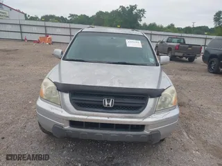 2003 Honda Pilot EX with VIN 2HKYF18523H543302, listed as a IAAI auction lot 42052364 with 331,473 mi miles. Bid and sale history available at carsss.com. Image 16.