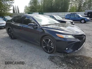 2020 Toyota Camry XSE with VIN 4T1K61AK2LU972205, listed as a Copart auction lot 55792685 with 106,696 mi miles and Salvage Title. Bid and sale history available at DreamBid. Image 4.