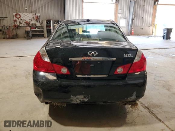 2007 Infiniti M x with VIN JNKAY01F77M460855, listed as a Copart auction lot 71068154 with 225,217 mi miles and Salvage Title. Bid and sale history available at DreamBid. Image 6.