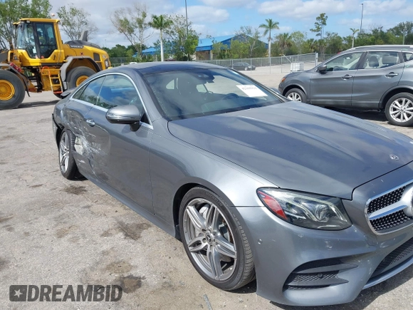 2018 Mercedes-Benz E 400 with VIN WDD1J6FB9JF015064, listed as a IAAI auction lot 42165914 with 95,290 mi miles and . Bid and sale history available at DreamBid. Image 6.