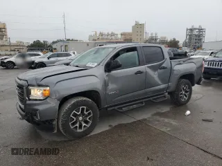 2021 GMC Canyon 4WD AT4 w/Leather with VIN 1GTG6FEN4M1116175, listed as a Copart auction lot 83679894 with 33,646 mi miles and Salvage Title. Bid and sale history available at carsss.com. Image 1.