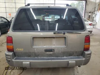 1996 Jeep Grand Cherokee Limited with VIN 1J4GZ78S5TC210710, listed as a Copart auction lot 81307904 with 285,169 mi miles and Salvage Title. Bid and sale history available at carsss.com. Image 6.