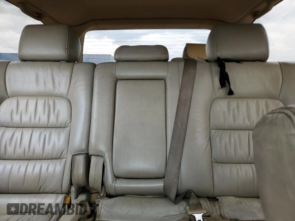 2003 Lexus LX 470 z VIN JTJHT00W733523370, wystawiony jako Copart lot #55516375 z przebiegiem 157 862 mil mil oraz Czysty tytuł • Clean title. Historia ofert i sprzedaży dostępna na DreamBid. Obrazek 10.