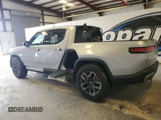 2022 Rivian R1T Launch Edition z VIN 7FCTGAAL7NN006406, wystawiony jako Copart lot #60049275 z przebiegiem 1 517 mil mil oraz Czysty tytuł • Clean title. Historia ofert i sprzedaży dostępna na DreamBid. Obrazek 3.