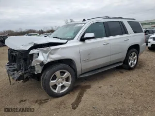 2015 Chevrolet Tahoe LS with VIN 1GNSKAKCXFR306859, listed as a Copart auction lot 83411724 with 154,517 mi miles and Salvage Title. Bid and sale history available at carsss.com. Image 1.