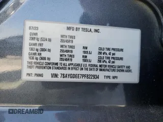 2023 Tesla Model Y Long Range z VIN 7SAYGDEE7PF822934, wystawiony jako Copart lot #49285285 z przebiegiem Nie podano mil oraz Szkoda całkowita • Salvage title. Historia ofert i sprzedaży dostępna na DreamBid. Obrazek 12.