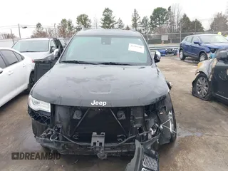 2015 Jeep Grand Cherokee Summit with VIN 1C4RJEJG3FC626002, listed as a IAAI auction lot 41295706 with 85,958 mi miles and . Bid and sale history available at DreamBid. Image 12.