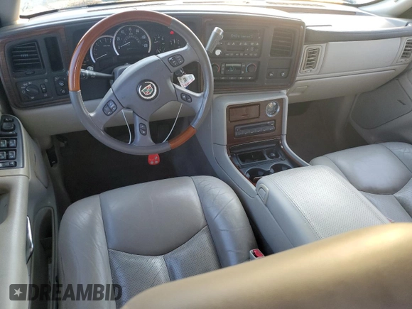2004 Cadillac Escalade z VIN 1GYEC63T54R236225, wystawiony jako Copart lot #74075944 z przebiegiem 169 093 mil mil oraz Szkoda całkowita • Salvage title. Historia ofert i sprzedaży dostępna na DreamBid. Obrazek 8.