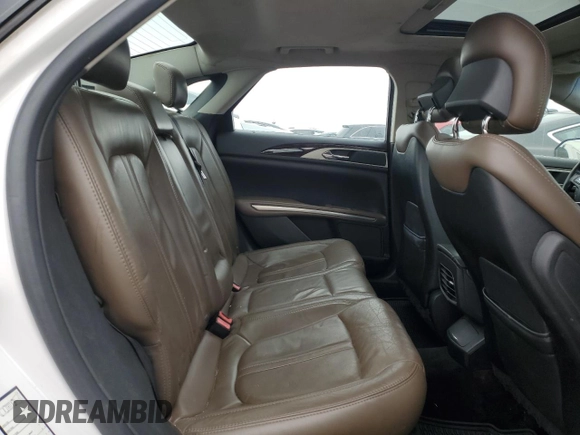 2014 Lincoln MKZ z VIN 3LN6L2G93ER811683, wystawiony jako Copart lot #52004485 z przebiegiem 188 134 mil mil oraz Szkoda całkowita • Salvage title. Historia ofert i sprzedaży dostępna na DreamBid. Obrazek 10.
