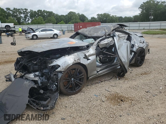 2019 BMW M5 z VIN WBSJF0C57KB447306, wystawiony jako Copart lot #71837424 z przebiegiem Nie podano mil oraz Szkoda całkowita • Salvage title. Historia ofert i sprzedaży dostępna na DreamBid. Obrazek 1.