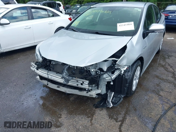 2022 Toyota Prius L Eco with VIN JTDKAMFU2N3161592, listed as a IAAI auction lot 42245464 with 146,891 mi miles and . Bid and sale history available at DreamBid. Image 6.