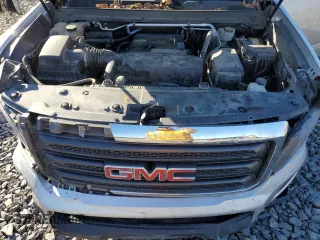 2016 GMC Canyon 2WD z VIN 1GTH5BEAXG1389414, wystawiony jako Copart lot #77198134 z przebiegiem 82 004 mil mil oraz Szkoda całkowita • Salvage title. Historia ofert i sprzedaży dostępna na DreamBid. Obrazek 11.