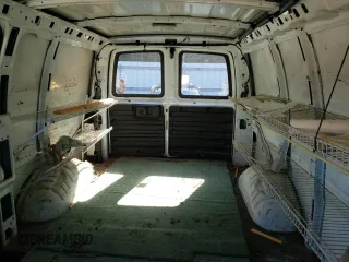 2006 Chevrolet Express Cargo Van with VIN 1GCGG25VX61197501, listed as a Copart auction lot 70395184 with 241,805 mi miles and Clean Title. Bid and sale history available at carsss.com. Image 10.