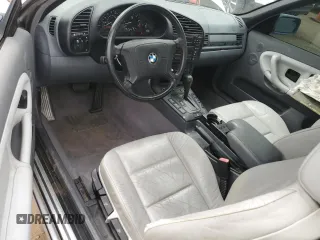 1998 BMW 3 Series 323i with VIN WBABJ8332WEM22760, listed as a Copart auction lot 59631805 with 77,300 mi miles and Salvage title. Bid and sale history available at DreamBid. Image 8.