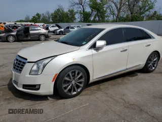 2014 Cadillac XTS z VIN 2G61L5S30E9249379, wystawiony jako Copart lot #54384115 z przebiegiem 170 314 mil mil oraz Tytuł czysty. Historia ofert i sprzedaży dostępna na DreamBid. Obrazek 1.