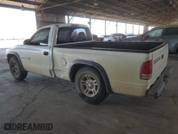2002 Dodge Dakota with VIN 1B7FL16X02S714861, listed as a Copart auction lot 74093644 with 164,199 mi miles and Salvage Title. Bid and sale history available at DreamBid. Image 2.