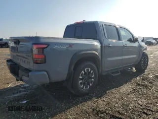 2022 Nissan Frontier Pro-X with VIN 1N6ED1EJ8NN609619, listed as a Copart auction lot 86608994 with 76,078 mi miles and Salvage title. Bid and sale history available at DreamBid. Image 3.