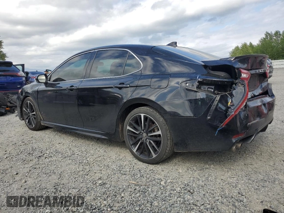 2020 Toyota Camry XSE with VIN 4T1K61AK2LU972205, listed as a Copart auction lot 55792685 with 106,696 mi miles and Salvage Title. Bid and sale history available at DreamBid. Image 2.