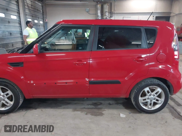 2011 Kia Soul + with VIN KNDJT2A23B7329051, listed as a IAAI auction lot 41963566 with 146,063 mi miles. Bid and sale history available at carsss.com. Image 14.