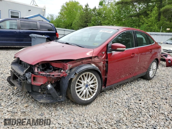 2014 Ford Focus Titanium with VIN 1FADP3J20EL352909, listed as a Copart auction lot 58501085 with 174,388 mi miles and Salvage title. Bid and sale history available at DreamBid. Image 1.
