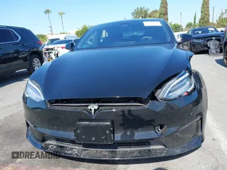 2022 Tesla Model S with VIN 5YJSA1E5XNF467435, listed as a IAAI auction lot 42538706 with 26,504 mi miles and . Bid and sale history available at DreamBid. Image 12.