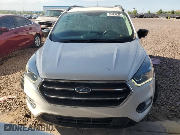 2017 Ford Escape SE z VIN 1FMCU9G97HUC26806, wystawiony jako Copart lot #65464674 z przebiegiem 93 023 mil mil oraz Szkoda całkowita • Salvage title. Historia ofert i sprzedaży dostępna na DreamBid. Obrazek 5.