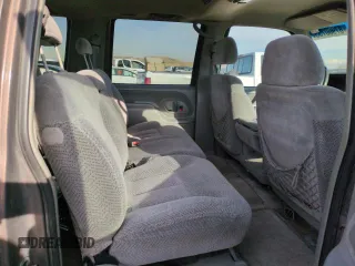 1998 GMC Suburban z VIN 3GKFK16R4WG507685, wystawiony jako Copart lot #87900735 z przebiegiem 183 033 mil mil oraz Szkoda całkowita • Salvage title. Historia ofert i sprzedaży dostępna na DreamBid. Obrazek 10.